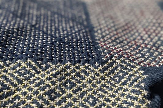 Sashiko on Denim. It isn't as "labor intensive" as it looks like.