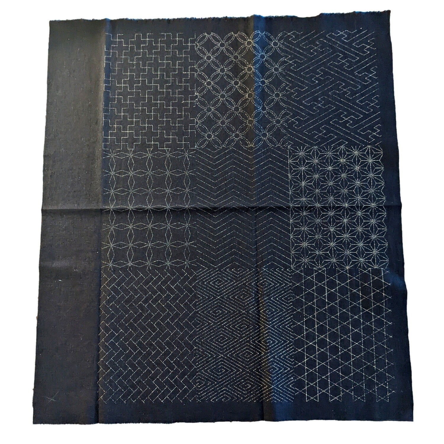 Sashiko fabric with Keiko design pattern featuring 9 traditional geometric patterns, ideal for stitching and crafting tapestries, pillows, and jackets.